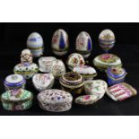 A collection of twenty trinket and pill boxes, mostly ceramic