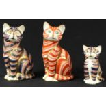 A Royal Crown Derby paperweight, Ginger Tom Cat, silver stopper; others, Cat, integral stopper;