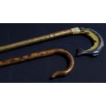 A fen walking stick, the handle modelled as a trout; another walking stick (2)