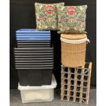 A pair of Sanderson Cascas pattern cushions, 39cm x 37cm; linen basket; 17 storage boxes, wine rack.