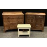 A 20th century Ercol style oak sideboard, rectangular top above two short drawers and two cupboard