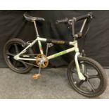 An original 1984 Raleigh Max Burner BMX bike, white frame, black skyway mag wheels, aeroyal seat,