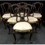 Six Victorian Rosewood salon chairs, shaped back, stuffed overseat, French cabriole forelegs