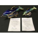 A Royal Crown Derby paperweight, Lyme Bay Dolphin Mother, exclusive signature edition for Goviers,