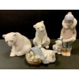 Lladro including Young Inuit Boy with Polar Bear Cub, two seated Polar Bears; a Basket of Chicks (4)
