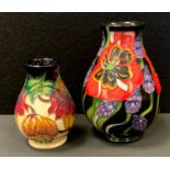 Moorcroft - an Emma Bossons 2009 limited edition vase, tube lined with vibrant red, orange and