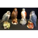 Four Beswick Gleneagles whisky decanters - Kestrel, Peregrine Falcon, Merlin and Buzzard, all sealed