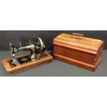 A Victa V.S hand powered sewing machine, cased.