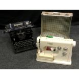 A Husqvarna Viking 6000 sewing machine (cased); an Imperial typewriter. (2)