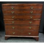 A George III mahogany secretaire chest, caddy top, three faux drawer front opening to fitted