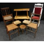 A Victorian painted rocking chair; a near pair of rush seat stools; an oak coffee table; another oak