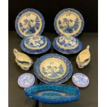 A pair of Booths Real Old Willow pattern tureen and cover; plates, bowl etc; a blue glass boat