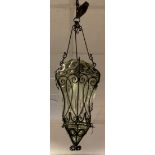 A 20th century Venetian style iron and smoke glass lantern light fitting, scrolling block bar