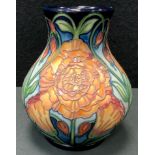 A Modern Moorcroft trial vase, tubelined with flowers, in tones of orange, pink, red ,pale blue