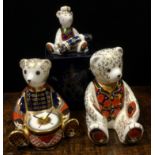 A Royal Crown Derby Paperweight Drummer Bear; others Seated Teddy Bear, both gold stopper; Christmas