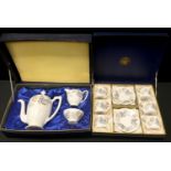 A Coalport special edition Jaguar Camelot pattern six setting coffee set, unused, boxed.