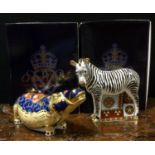 A Royal Crown Derby Paperweight Zebra; another Hippopotamus, both gold stopper, both boxed (2)