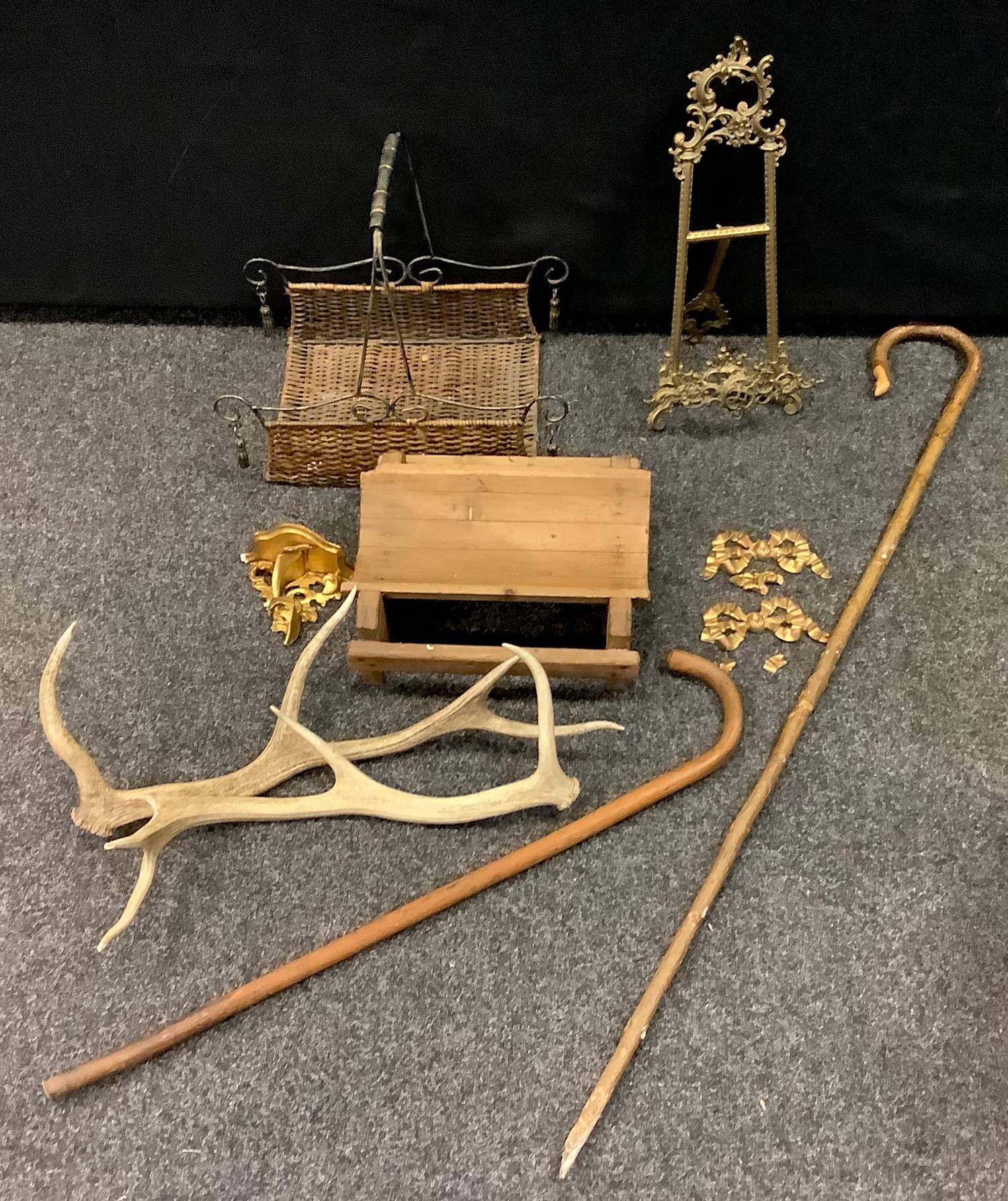 A contemporary basket; a pine stilton trough; two shepherds sticks; a brass easel; etc