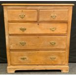 A 20th century pine chest of drawers, rectangular top above two short and three long graduated