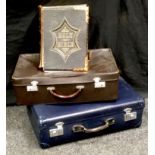 A late 19th century brass bound Holly Bible, Globe Trotter suitcase; another, Antler