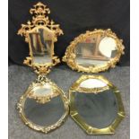 A gilt oval mirror, 60cm high; another; etc (4)