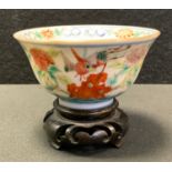 A Chinese tea bowl, decorated with chrysanthemums and fanciful bird, 8.5cm diam, seal mark,