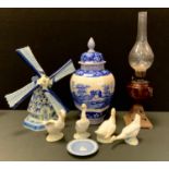 A large Spode blue tower pattern urn and cover, set four Nao ducks; blue and white Windmill; a