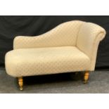 A modern child?s chaise longue, cream upholstery, 110cm long.