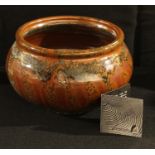 Studio pottery - a John Leach bowl, in brown and black glazes, 13cm high