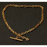 A late 19th century 9ct rose gold fancy link Albert chain with T-bar, marked 9ct, 23.5g, 39cm long