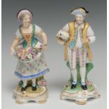 A Sampson Hancock Derby figure, of a lady, holding colourful summer flowers in her apron, scroll