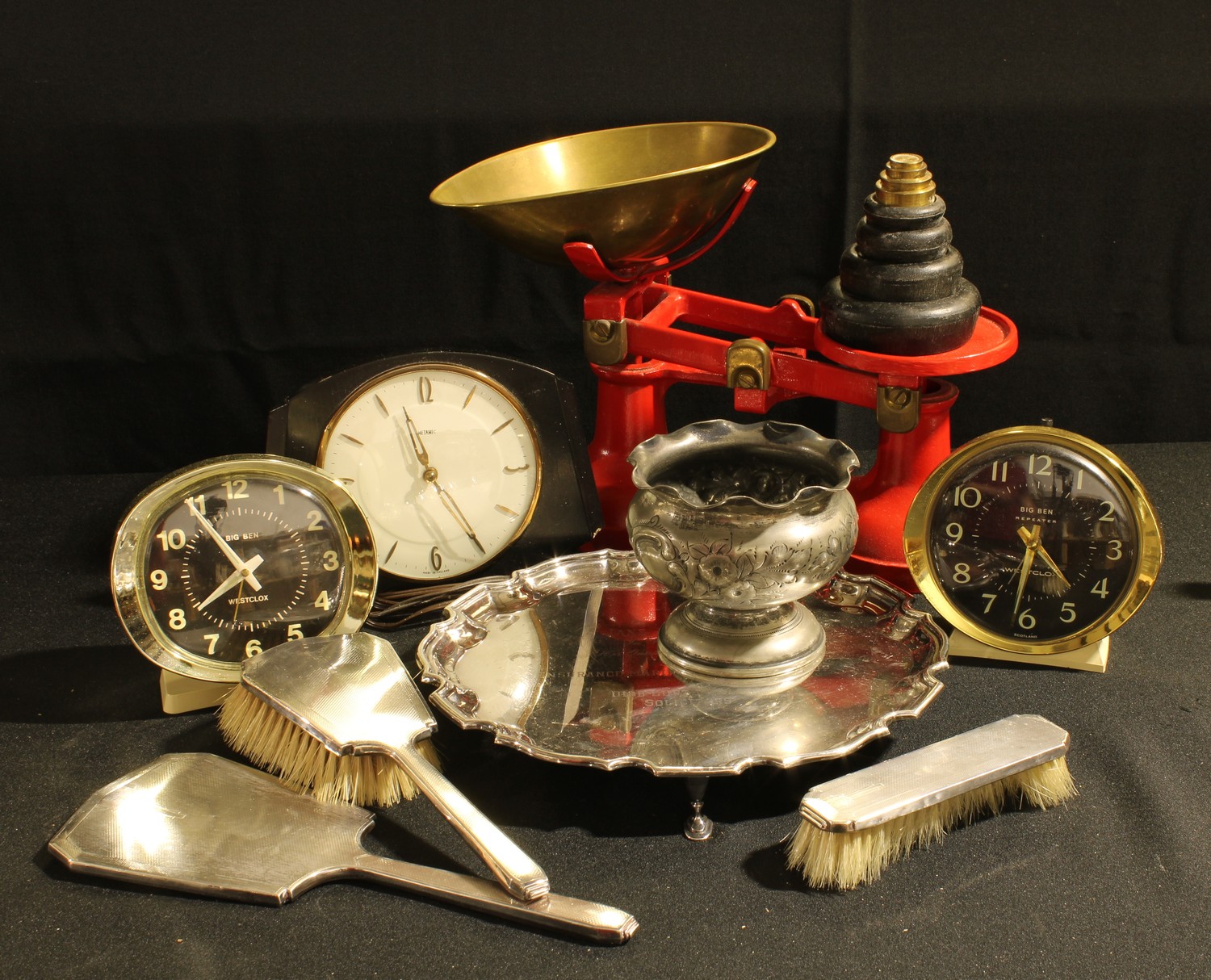 A silver three piece vanity set, Birmingham 1939; 1960's/70's alarm clocks; a set of Thornton Viking