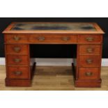 A late Victorian mahogany twin pedestal desk, rectangular top with tooled and gilt writing surface