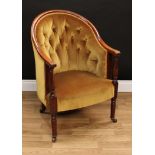 An early Victorian mahogany drawing room chair, in the manner of Gillow of Lancaster, arched back