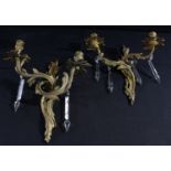 A Rococo style two branch candle wall sconce; another similar (2)
