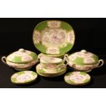 A Mintons Green Cockatrice pattern dinner service, for six, comprising two tureens and covers,