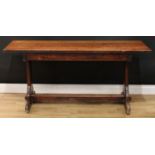 A vernacular mahogany refectory trestle dining table, rectangular top, shaped end supports,