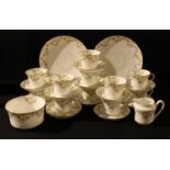 An early 20th century Salon China (Salt & Nixon) part tea service comprising cake plates, side