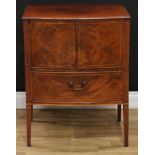 An Edwardian mahogany bow front bedside cabinet, 77.5cm high, 61cm wide, 47cm deep
