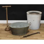 A galvanized dolly tub; a copper clothes ponch; a tin bath; a garden syringe (4)