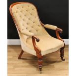 A William IV/early Victorian mahogany spoon back library chair, deep-buttoned stuffed-over