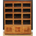 An early 20th century Globe Wernicke style modular stacking 'solicitor' library bookcase or