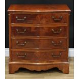 A mahogany serpentine chest of four long drawers, 78.5cm high, 74cm wide, 46.5cm deep