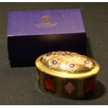 A Royal Crown Derby Imari 1128 pattern oval trinket pot and cover, To Commemorate the Opening of
