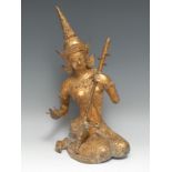 Asian School, a gilt bronze, of a Thai musician, seated, playing a saw duang, 36cm high