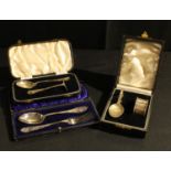 A silver baby's christening feeding set, Sheffield 1934, cased; two similar silver plated