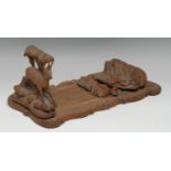 A Black Forest bookslide, the folding ends carved with mountain goats, 32cm wide (closed), c.1870