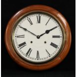 A mahogany circular chiming school clock, Roman numerals, twin winding holes, key and pendulum, 40cm