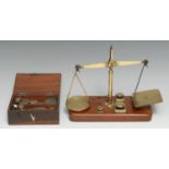 A set of 19th century brass and mahogany letter scales, by J & E Ratcliff, rounded rectangular base,