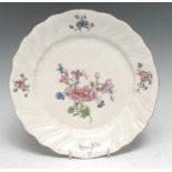 A rare French experimental hard paste porcelain plate, probably Brancas-Lauraguais, painted in the